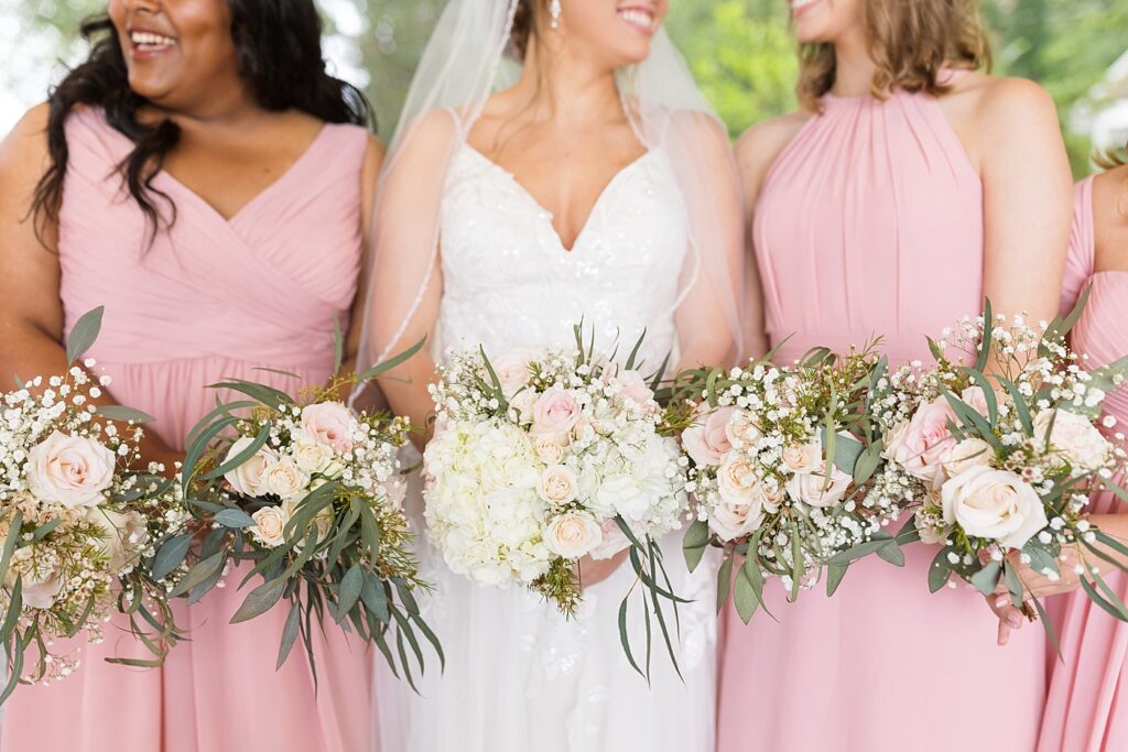 Bride and bridal party holding bouquets | Rustic wedding | Harvest House Wedding | Harvest House Photographer | Raleigh NC Wedding Photographer