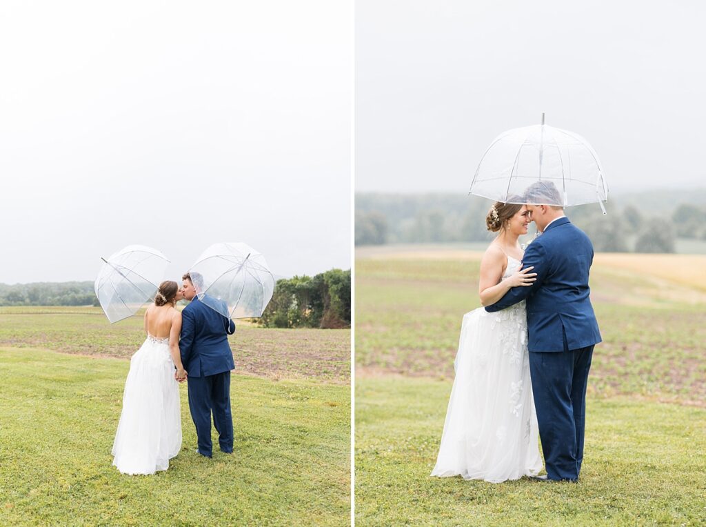 Bride and groom kissing on field holding an umbrella | Rainy wedding | Rustic wedding | Harvest House Wedding | Harvest House Photographer | Raleigh NC Wedding Photographer