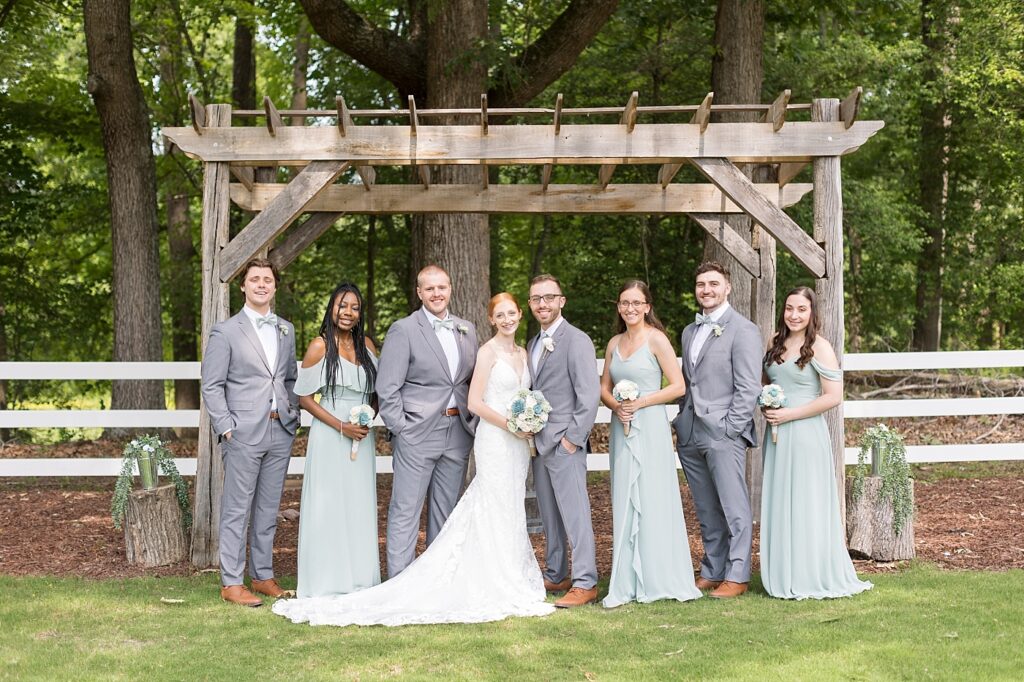 Bride and groom with wedding party | Rustic Wedding | Twin Oaks Barn Wedding | Twin Oaks Barn Wedding Photographer | Raleigh NC Wedding Photographer
