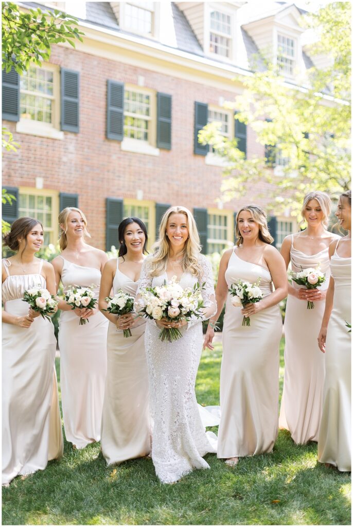 Bride and bridesmaids holding neutral color bouquet | Classic Summer Wedding | Wedding with Neutrals | Carolina Inn Wedding | UNC Alumni Wedding | Raleigh Wedding Photographer | NC Wedding Photographer