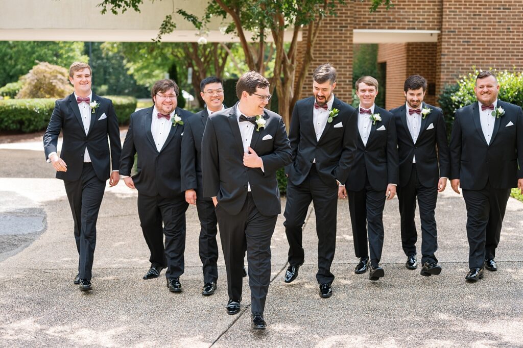 Groom and groomsmen walking together | Summer Wedding | The Matthews House Wedding | The Matthews House Wedding Photographer | Raleigh NC Wedding Photographer