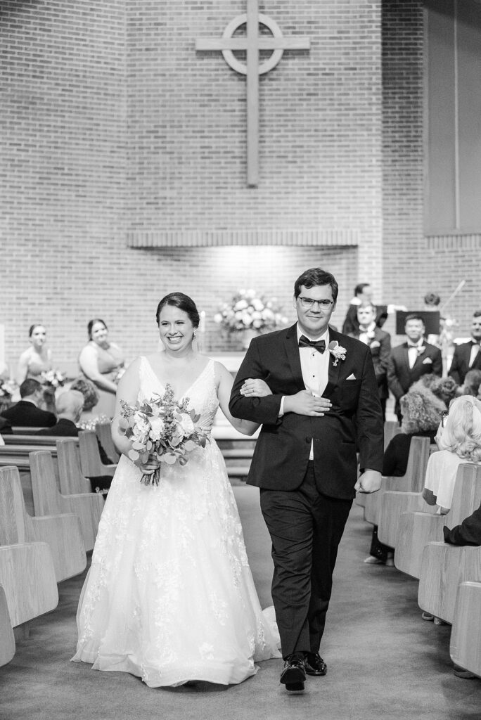 Bride and groom walking down aisle after wedding ceremony | Summer Wedding | The Matthews House Wedding | The Matthews House Wedding Photographer | Raleigh NC Wedding Photographer