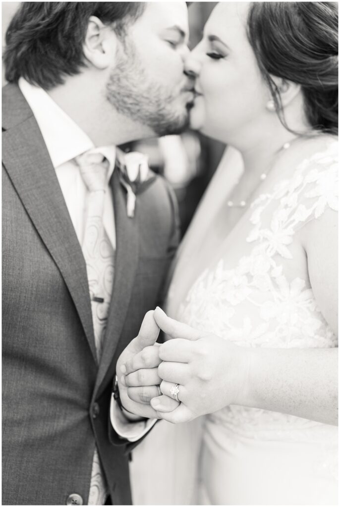Bride and groom secret handhold | Caffe Luna Wedding | Caffe Luna Wedding Photographer | Raleigh NC Wedding Photographer