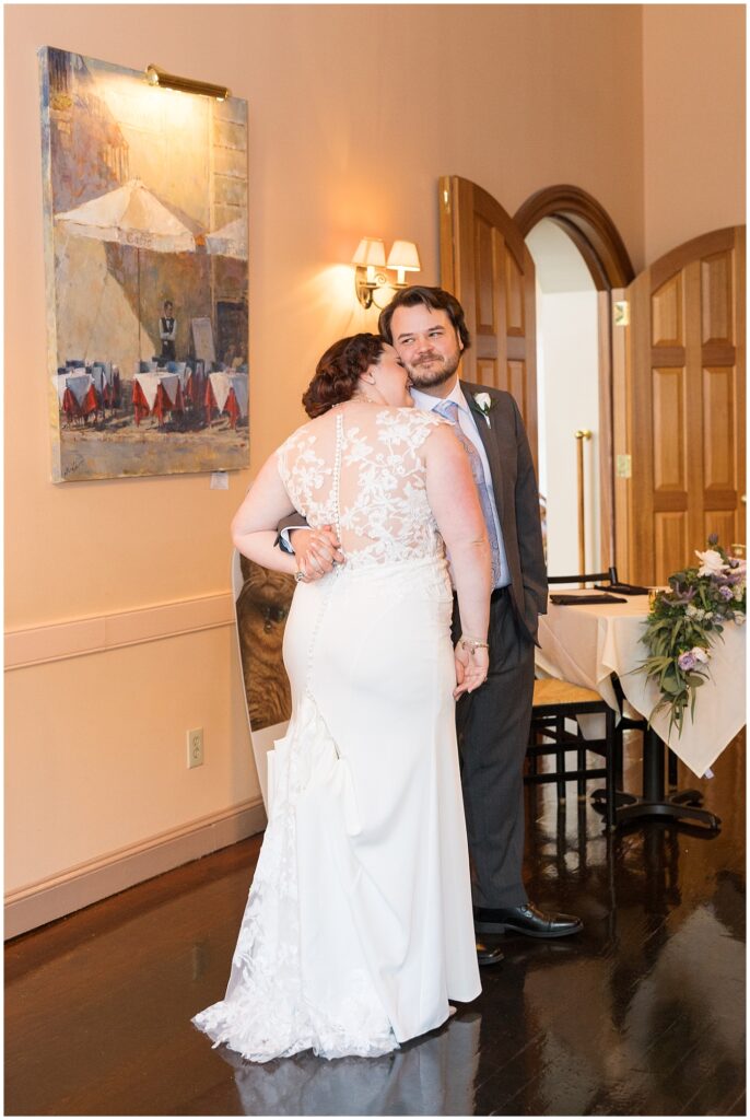 Bride and groom embracing during reception | Caffe Luna Wedding | Caffe Luna Wedding Photographer | Raleigh NC Wedding Photographer
