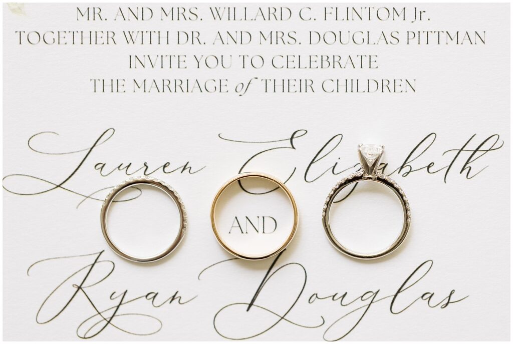 Wedding rings displayed on wedding invitation | Summer Wedding | Angus Barn Wedding | Angus Barn Wedding Photographer | Raleigh NC Wedding Photographer