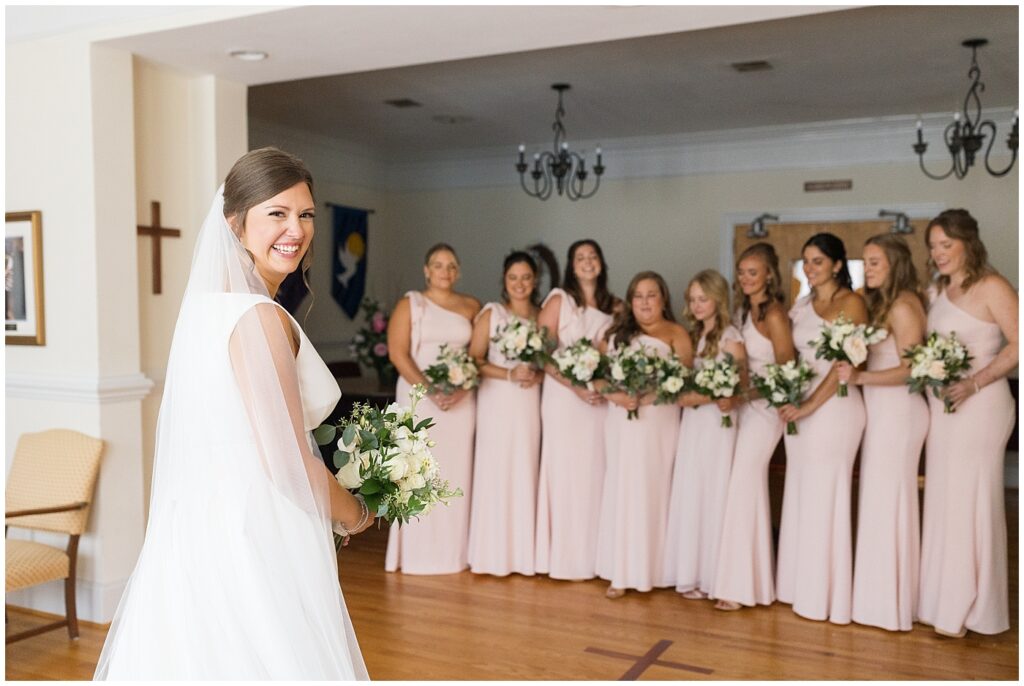 Bride and bridesmaids first look | Summer Wedding | Angus Barn Wedding | Angus Barn Wedding Photographer | Raleigh NC Wedding Photographer