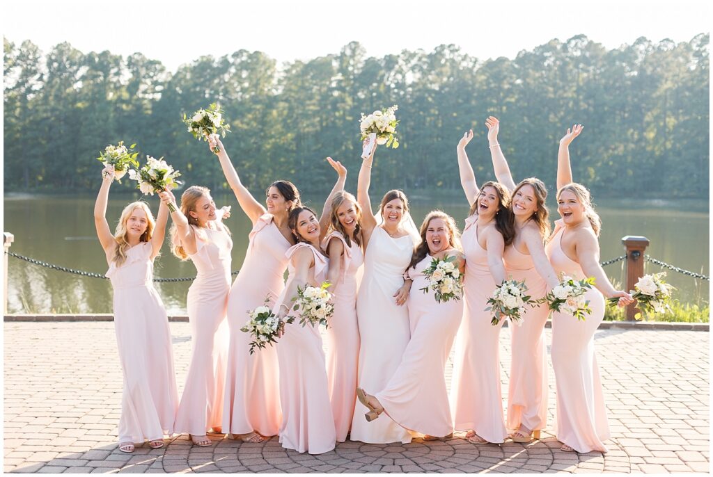 Bride and bridesmaid posing inspiration | Summer Wedding | Angus Barn Wedding | Angus Barn Wedding Photographer | Raleigh NC Wedding Photographer