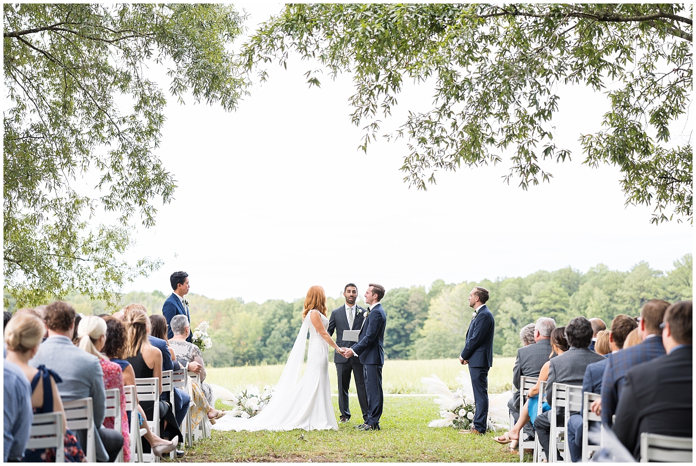 Fall Wedding at The Meadows in Raleigh under the Oak Trees after a rainstorm | Raleigh NC Wedding Photographer