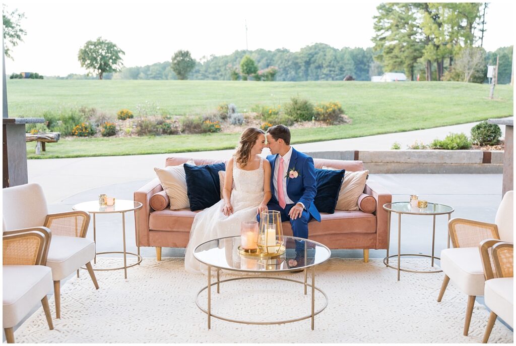 Bride and groom sitting on couch | The Meadows Wedding | The Meadows Wedding Photographer | Raleigh NC Wedding Photographer