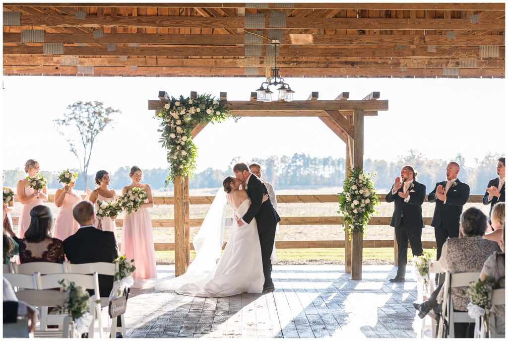Wedding first kiss, outdoor wedding venue, wedding details,  Mt Pleasant wedding venue, NC wedding photographer