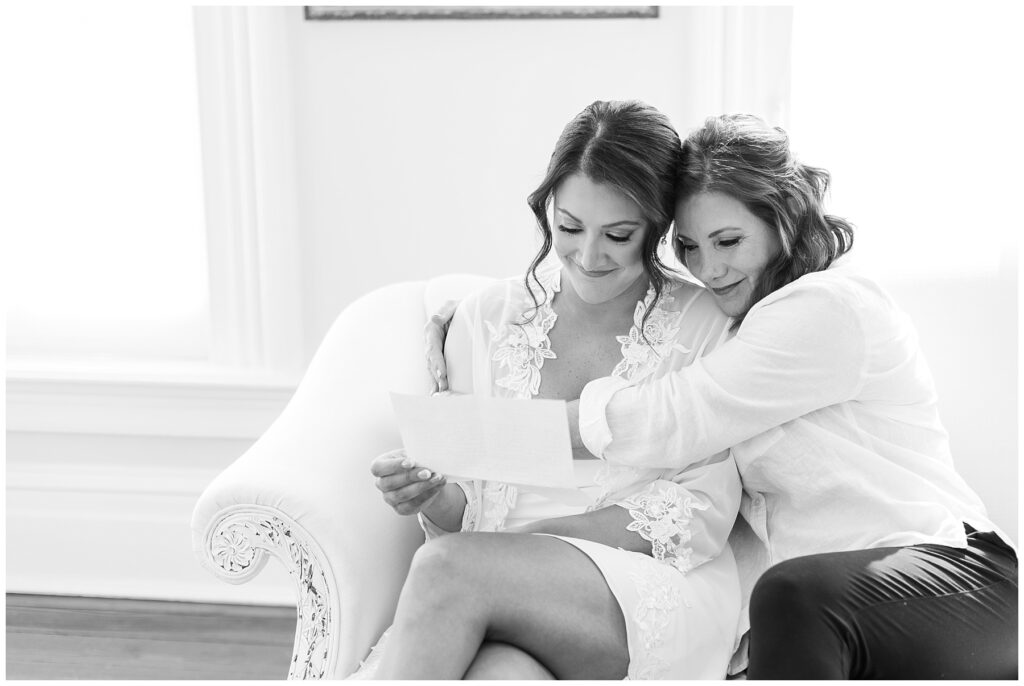 Bride and mother of bride hugging | Merrimon-Wynne Wedding | Raleigh NC Wedding Photographer 