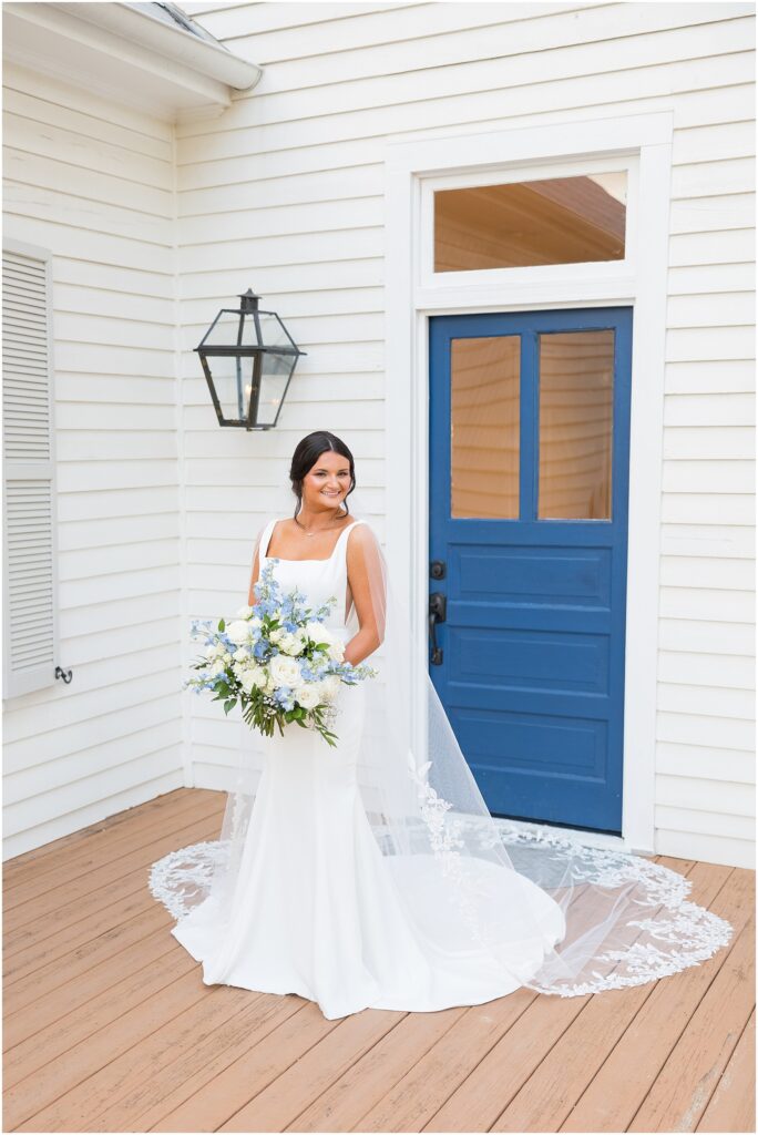 Bridal Photos with Blue Door and southern gas lanterns on the porch | Cary NC Wedding Venues | Raleigh Wedding Photographer