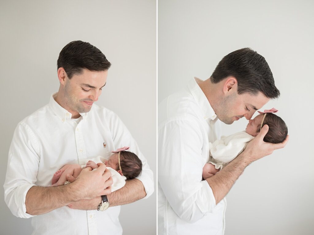 dad cuddling baby | dad holding newborn | lifestyle newborn photos | in home newborn session | girl newborn photos | raleigh newborn photographer