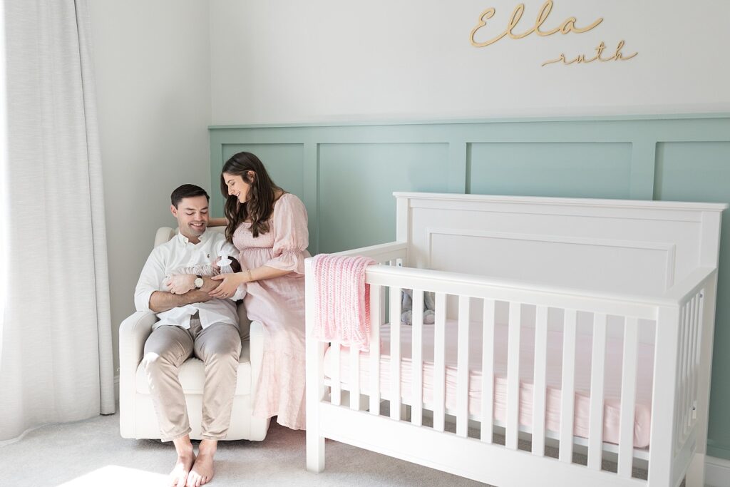 new parents | newborn photography Raleigh NC | baby girl newborn session | swaddled baby girl | lifestyle family photography | lifestyle nursery photos