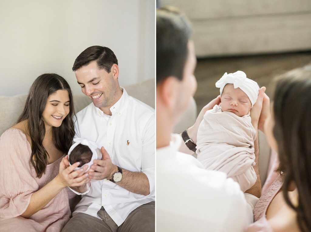 sleeping swaddled baby | baby girl with bow | new parents holding baby | lifestyle newborn photos | in-home newborn session | newborn photography Raleigh NC | Raleigh newborn photographer