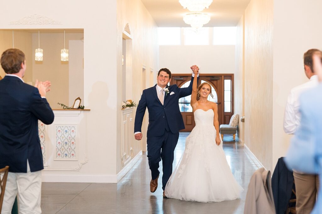 wedding reception entrance, bride and groom, the legacy at willow pond wedding, Raleigh wedding photographer, historic venues in Virginia, Virginia wedding photos