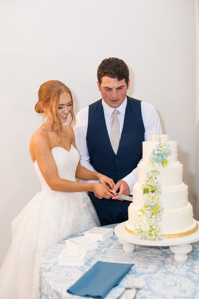 cake cutting, the legacy at willow pond wedding, Raleigh wedding photographer, historic venues in Virginia, classic wedding venue, the legacy at willow pond wedding inspiration, Virginia wedding photos