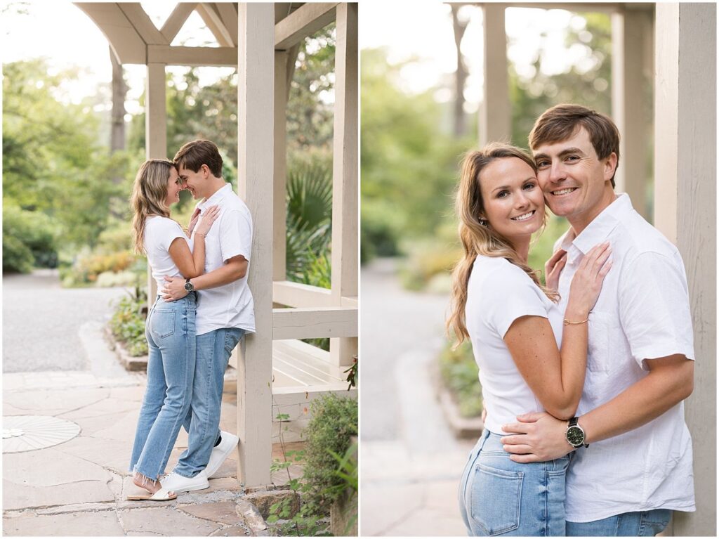 Erin and Cooper leaning against one another during their spring engagement session at Duke Gardens wearing a casual outfit, jeans and white tshirts | Sarah Hinckley Photography